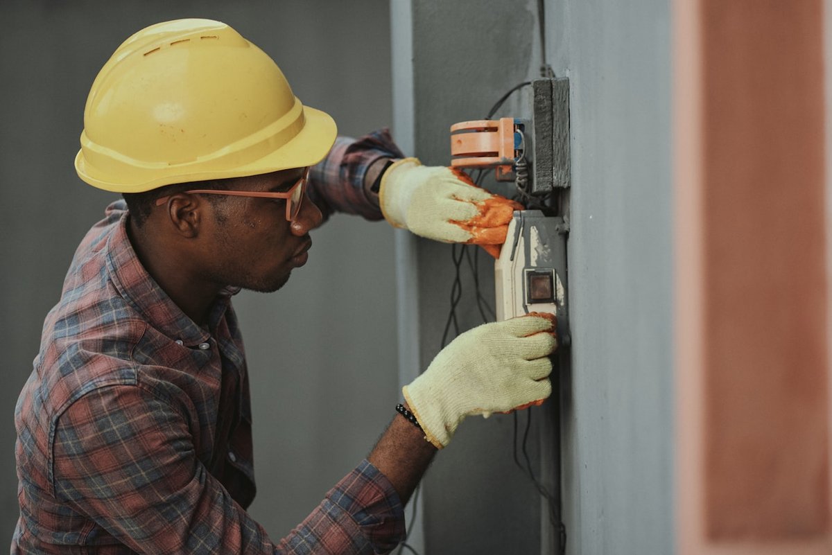 Field engineer performing HVAC diagnostics
